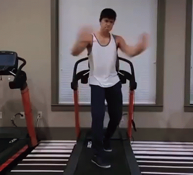 Man Dancing on Treadmill in Gym