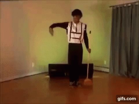 Man Dancing on Wooden Floor With Microphone