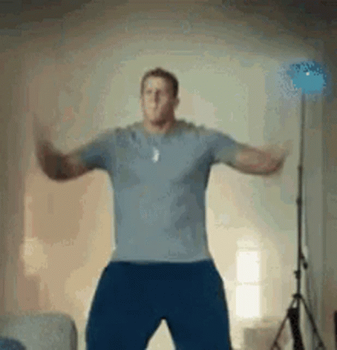 Man Dancing With Arms Outstretched GIF