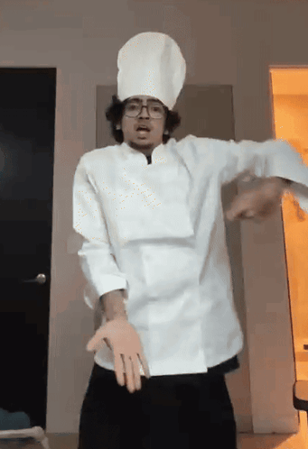 Man Dancing with Chef Hat and Glasses