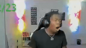 Man Dancing With Headphones in Neon Room