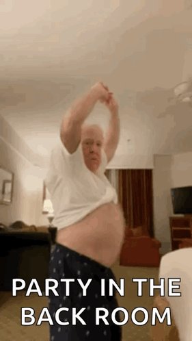 Man Dancing With Party In The Back Room GIF