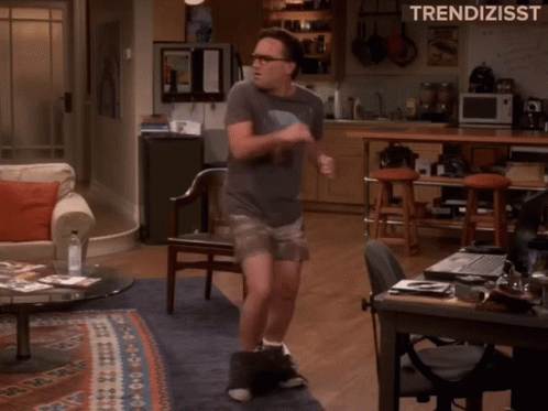 Man Dancing With Trendisst Behind Him