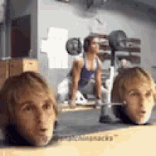 Man Deadlifting Heads Meme GIF