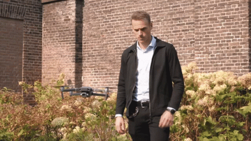 Man Deploying The Drone GIF