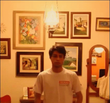 Man Disappearing While Undressing GIF