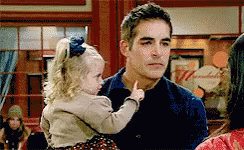 Man Distracted By Baby's Finger GIF