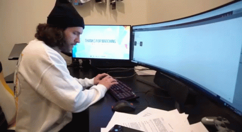 Man Distracted From Working GIF