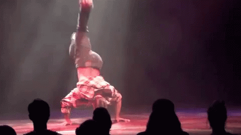 Man Doing Handstand On Stage GIF