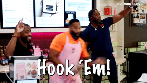 Man Doing Hook Em Sign While Shouting GIF