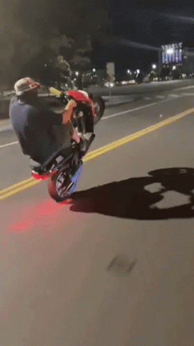 Man Doing Motorcycle Trick GIF