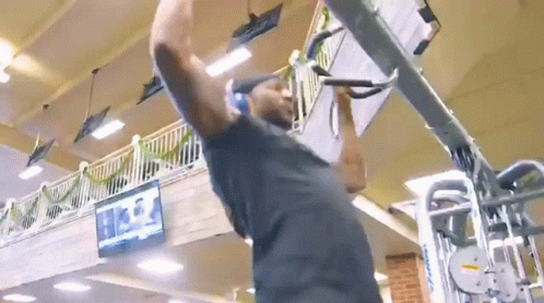 Man Doing Pull Ups In Gym GIF