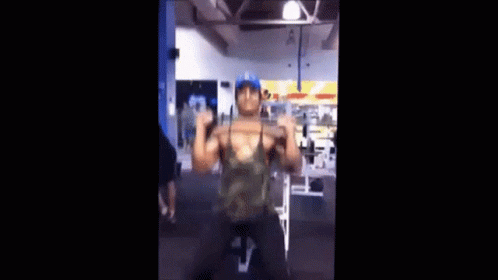 Man Doing Pull Ups in Gym