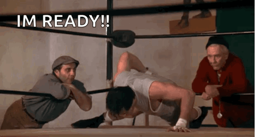 Man Doing Push Ups in Boxing Ring