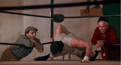 Man Doing Push Ups In Boxing Ring With Watcher GIF
