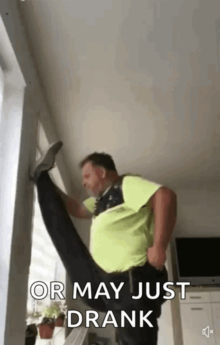 Man Doing Split Next To Window GIF