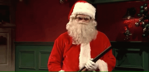 Man Dressed As Santa Claus Holding Cane GIF