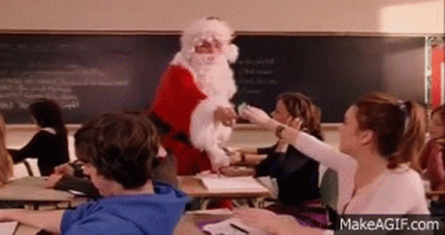 Man Dressed As Santa Claus In Classroom GIF