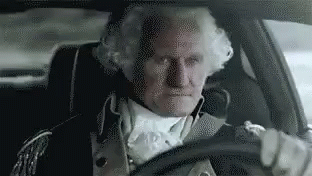 Man Dressed as Washington DC Driving Car