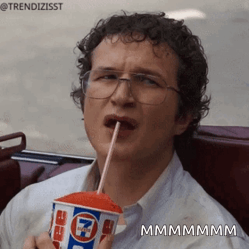 Man Drinking 7 Eleven Cup