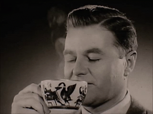Man Drinking Coffee With Duck GIF