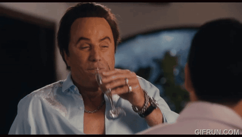 Man Drinking From Glass