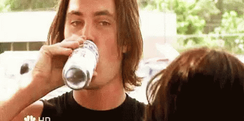 Man Drinking Glass of Water