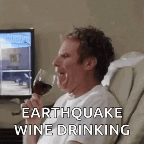 Man Drinking Glass of Wine on Couch