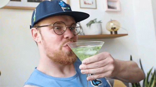 Man Drinking Green Martini GIF