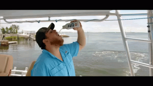 Man Drinking Lite Bottle