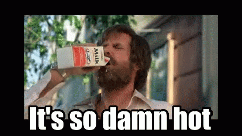 Man Drinking Milk From Carton Saying It's So Damn Hot