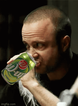 Man Drinking W-Up from Glass