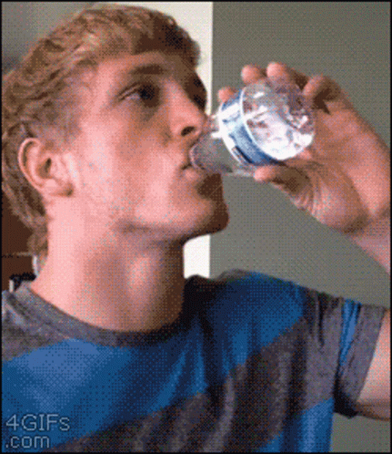 Man Drinking Water from Bottle