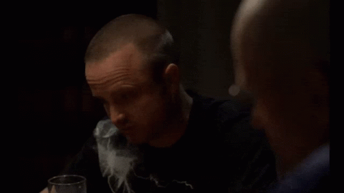 Man Drinking Water While Watching