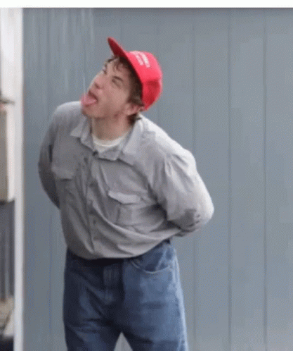 Man Drinking Wearing Maga Cap GIF