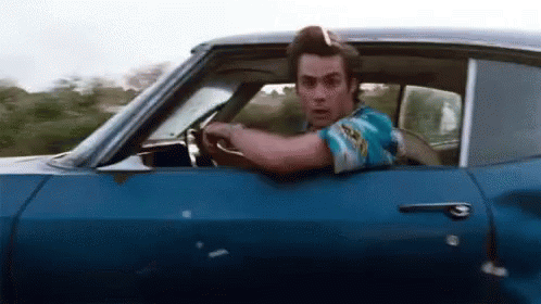 Man Driving Blue Car