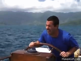 Man Driving Boat in Ocean