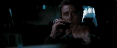 Man Driving Car at Night