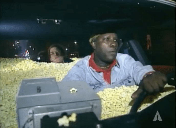 Man Driving Car Full Of Popcorn Meme GIF