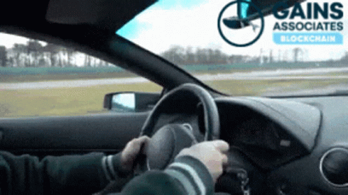 Man Driving Car Gains Associates Blockchain