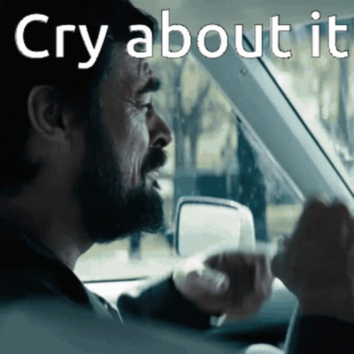 Man Driving Car Saying Cry About It