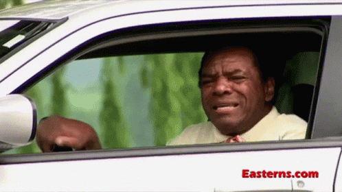 Man Driving Car With Easterns.com GIF