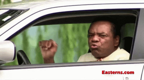 Man Driving Car With Easterns.com GIF