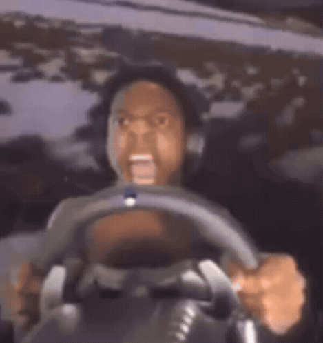Man Driving Car With Mouth Open GIF