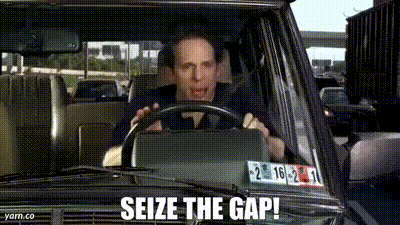 Man Driving Car With Seize The Gap On Windshield GIF