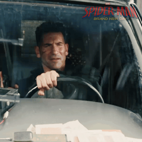 Man Driving Car With Spider-Man