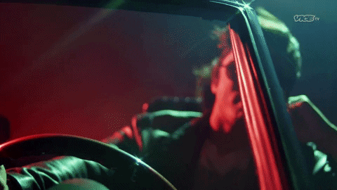 Man Driving Fast Car In Slow Motion GIF