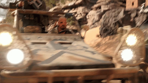 Man Driving Military Vehicle