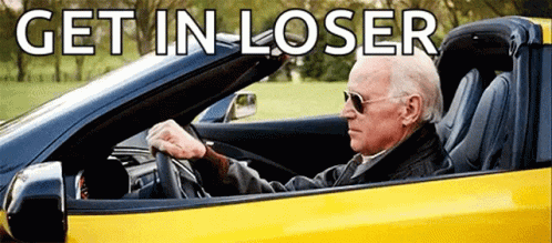 Man Driving Yellow Sports Car Saying Get In Loser