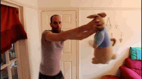 Man Drop Kick On A Doll GIF